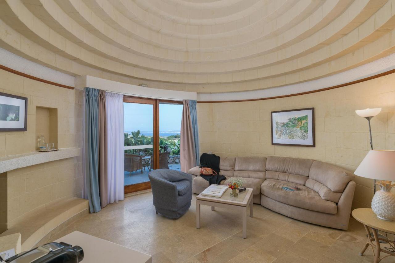 Hotel Ta' Cenc & Spa Sannat Exterior foto A suite at the Atlantis Paradise Island